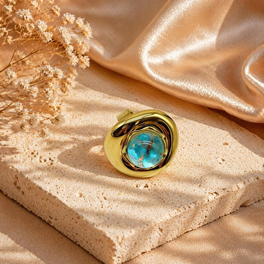 Anello Elegance Dorato con Pietra Azzurra
